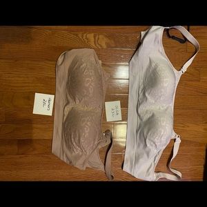 Set of two sport bras with clasps in back.